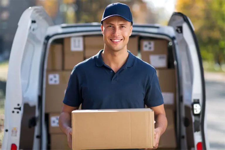 Delivery man carrying a box.